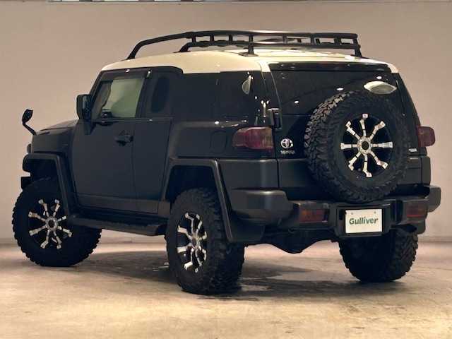 トヨタ ＦＪクルーザー ブラックカラーパッケージ 宮城県 2013(平25)年 7.8万km ブラック/ホワイト ４WD/クルーズコントロール/SDナビ/フルセグTV/バックカメラ/USB入力端子/Bluetooth/ETC/RRDIFFLOCK/ルーフラック/背面タイヤ/4駆切り替え/クリアランスソナー/アクティブトラクションコントロール/クリムソンMGモンスターアルミホイール/純正フロアマット