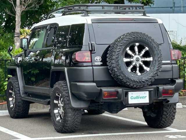 トヨタ ＦＪクルーザー ブラックカラーパッケージ 宮城県 2013(平25)年 7.8万km ブラック/ホワイト ４WD/クルーズコントロール/SDナビ/フルセグTV/バックカメラ/USB入力端子/Bluetooth/ETC/RRDIFFLOCK/ルーフラック/背面タイヤ/4駆切り替え/クリアランスソナー/アクティブトラクションコントロール/クリムソンMGモンスターアルミホイール/純正フロアマット