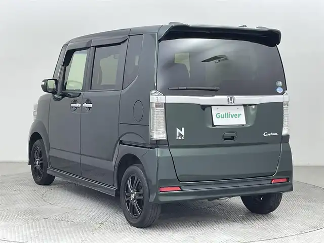 ホンダ Ｎ ＢＯＸ カスタム SSブラックSパッケージ 道央・札幌 2017(平29)年 4.9万km ブリティッシュグリーンP ・４WD/・寒冷地仕様/・純正メモリナビ/　BT／USB／CD／DVD／SD／iPod／AUX／フルセグ/・純正ビルトインETC/・社外前後ドライブレコーダー/・バックカメラ/・衝突軽減ブレーキ/・シティブレーキアクティブシステム/・横滑り防止/・両側パワースライドドア/・前席シートヒーター/・純正サマー14インチAW/・純正フロアマット/・ベンチシート/・オートライト/・プッシュスタート/・スマートキー