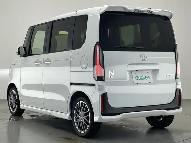 ホンダ Ｎ ＢＯＸ カスタム ターボ 愛知県 2025(令7)年 0.3万km プラチナホワイトパール 純正８型ナビ　ドラレコ　バックカメラ　禁煙車　ＥＴＣ　黒ハーフレザー　パドルシフト　ホンダセンシング　衝突軽減　追従クルコン　フルセグＴＶ　シートヒーター　ＬＥＤオートライト　両側電動スライド　ＵＳＢ