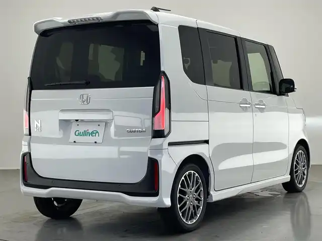 ホンダ Ｎ ＢＯＸ カスタム ターボ 愛知県 2025(令7)年 0.3万km プラチナホワイトパール 純正８型ナビ　ドラレコ　バックカメラ　禁煙車　ＥＴＣ　黒ハーフレザー　パドルシフト　ホンダセンシング　衝突軽減　追従クルコン　フルセグＴＶ　シートヒーター　ＬＥＤオートライト　両側電動スライド　ＵＳＢ