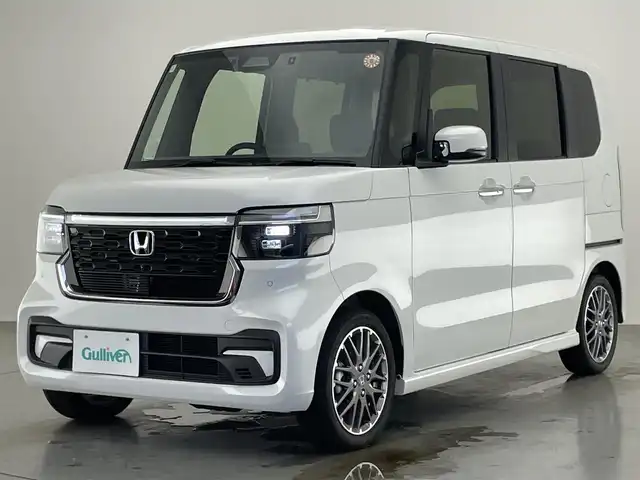 ホンダ Ｎ ＢＯＸ カスタム ターボ 愛知県 2025(令7)年 0.3万km プラチナホワイトパール 純正８型ナビ　ドラレコ　バックカメラ　禁煙車　ＥＴＣ　黒ハーフレザー　パドルシフト　ホンダセンシング　衝突軽減　追従クルコン　フルセグＴＶ　シートヒーター　ＬＥＤオートライト　両側電動スライド　ＵＳＢ