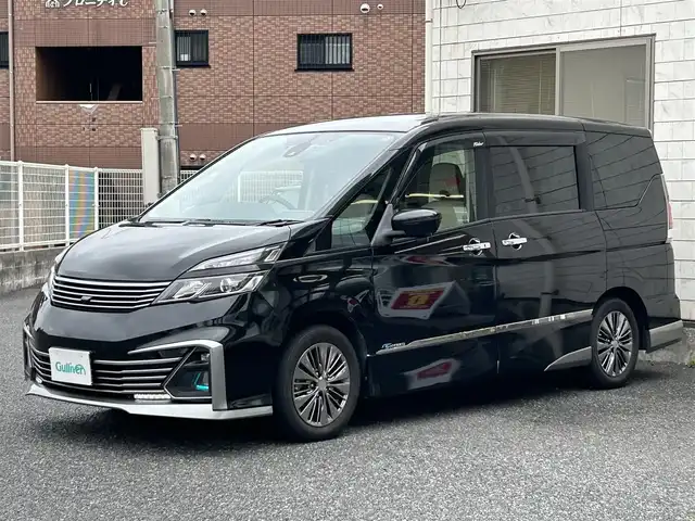 日産 セレナ ライダー オーテック 30th 福岡県 2016(平28)年 6.5万km ダイヤモンドブラック 純正9インチメモリナビ【MM516D-L】/　（AM/FM/CD/DVD/Bluetooth/フルセグTV）/フロント/サイド/バックカメラ/アラウンドビューモニター/純正フリップダウンモニター/セーフティサポート/・プロパイロット/・エマージェンシーブレーキ/・踏み間違え衝突防止アシスト/・進入禁止標識検知/・車線逸脱警報/・ふらつき警報/インテリジェンスパーキング/レーダークルーズコントロール/オートライト/横滑り防止装置/アイドリングストップ/純正16インチアルミホイール/両側パワースライドドア/デジタルインナーミラー/白色レザーシート/純正フロアマット/ビルトインETC/COMTEC製360度ドライブレコーダー【HDR360GW】/後部座席サンシェード/ドアバイザー/電格ウインカーミラー/電源ソケット×1/ISOFIX/スペアキー×1/保証書/取扱説明書/ナビ取扱説明書