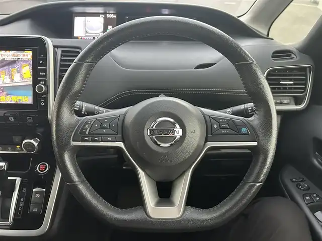 日産 セレナ ハイウェイスター Vセレクション 岡山県 2017(平29)年 7.8万km マルーンレッド 2トーン 登録時走行距離77555km/プロパイロット/純正9インチワイドナビ/フルセグTV(AM.FM.CD.DVD.TV.BT)/純正フリップダウンモニター/両側パワースライドドア/アラウンドビューモニター/デジタルインナーミラー/ビルトインETC/純正ドライブレコーダー/クリアランスソナー/衝突軽減ブレーキ/横滑り防止装置/クルーズコントロール(追従走行あり)/車線逸脱警報（レーンキープアシスト）/LEDヘッドライト/オートライト/オートマチックハイビーム/アイドリングストップ/16インチ純正AW/純正フロアマット