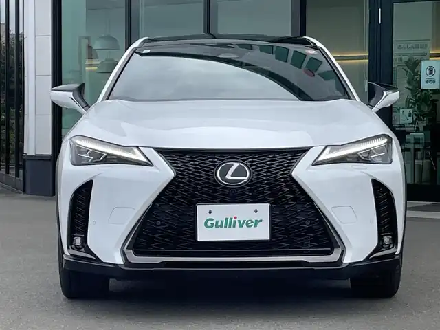 レクサス ＵＸ 300h Fスポーツ 東京都 2024(令6)年 0.9万km ブラック/ホワイトノーヴァガラスフレーク パノラマルーフ/純正ナビ/フルセグ/パノラミックビューモニター/ビルトインETC/パドルシフト/シートヒーター/ベンチレーションシート/AC100V/3眼LEDヘッドライト/オレンジキャリパー/ヘッドアップディスプレイ/レクサスセーフティシステム＋/・プリクラッシュセーフティ/・レーントレーシングアシスト/・オートマチックハイビーム/・アダプティブハイビームシステム/・レーダークルーズコントロール/・ブラインドスポットモニター/スマートキー