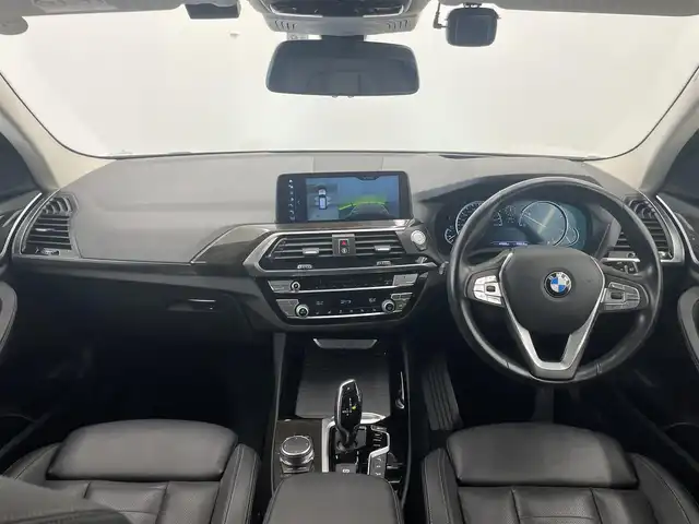 ＢＭＷ Ｘ３ xDrive20d Xライン 岡山県 2018(平30)年 4.8万km ミネラルホワイト BMW純正iDriveナビ/全周囲カメラ/ドラレコ（F）/ポプラウッドトリム/HUD/SOSコール/ワイヤレス充電トレイ/ミラー一体型ETC/ひりディセントコントロール/歩行者警告/衝突警告車線変更警告/側面衝突警告/Bluetooth/USB/PDC/レザーシート/シートヒーター/ブレーキオートホールド/PTG