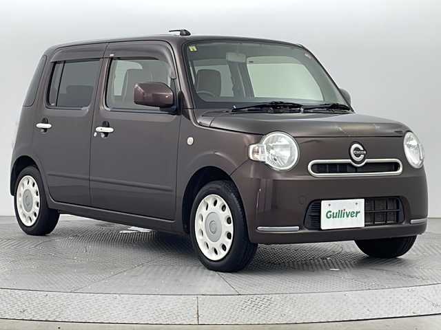 ダイハツ ミラ ココア プラスX スペシャルコーデ 新潟県 2014(平26)年 7.1万km プラムブラウンクリスタルマイカ 4WD/社外メモリナビ/フルセグ/AVN-Z03iW/　CD/SD/Bluetooth/スマートキー/アイドリングストップ/ヘッドライトレベライザー/電動格納式ミラー/ドアバイザー/社外アルミ付きスタッドレス/　（積み込み５mm）