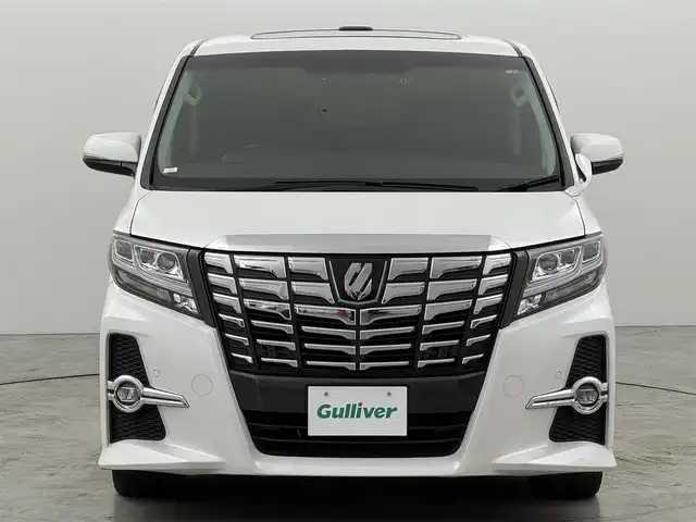 トヨタ アルファード S Cパッケージ 福岡県 2015(平27)年 6.6万km ホワイトパールクリスタルシャイン ツインサンルーフ　/後席モニター　/純正９型ナビ　/セーフティセンス　/レーダークルコン　/両側電動スライドドア　/電動リアゲート　/全席電動シート　/ステアリングヒーター　/ビルトインＥＴＣ　/ドラレコ　/ＷＡＣ　/ＬＥＤ