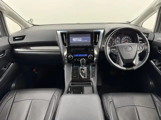 トヨタ アルファード S Cパッケージ 福岡県 2015(平27)年 6.6万km ホワイトパールクリスタルシャイン ツインサンルーフ　/後席モニター　/純正９型ナビ　/セーフティセンス　/レーダークルコン　/両側電動スライドドア　/電動リアゲート　/全席電動シート　/ステアリングヒーター　/ビルトインＥＴＣ　/ドラレコ　/ＷＡＣ　/ＬＥＤ