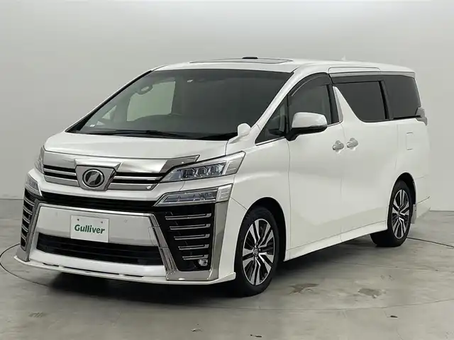 トヨタ ヴェルファイア Z Gエディション 福岡県 2018(平30)年 5.3万km ホワイトパールクリスタルシャイン Ｗサンルーフ　/Ｆ／Ｒエアロパーツ　/純正１０型ナビ/フルセグTV　/バックカメラ　/トヨタセーフティセンス　/コーナーセンサー　/レーダークルーズコントロール　/衝突軽減ブレーキ　/レーンキープ　/アクセル踏み間違い防止　/ＭＴモード付ＡＴ　/両側電動スライドドア　/パワーバックドア　/ステアリングヒーター　/シートヒーター／ベンチレーション　/シートメモリー付きパワーシート　/オートマチックハイビーム　/３眼ＬＥＤヘッドライト