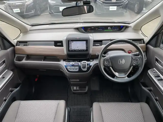 ホンダ フリード ハイブリット G ホンダセンシング 東京都 2021(令3)年 3.5万km シルバーミストグリーンM Honda SENSING/ナビ装着用スペシャルパッケージ/純正ナビ（VXM-214VFi）/AM/FM/CD/DVD/SD/USB/Bluetooth/フルセグTV/バックカメラ/両側パワースライドドア/LEDヘッドライト/LEDアクティブコーナリングライト/ETC車載機/Hondaスマートキーシステム&パワースイッチ/オートリトラミラー/Cパッケージ/・ロールサンシェード/・UVカット機能付フロントウインドウガラスIRカット〈遮熱〉/・スーパーUVカットフロントドアガラス/・コンフォートビューパッケージ（親水/ヒーテッドドアミラー＋フロントドア撥水ガラス＋熱線入りフロントウインドウ）/・運転席&助手席シートヒーター/・プラズマクラスター技術搭載フルオート・エアコンディショナー