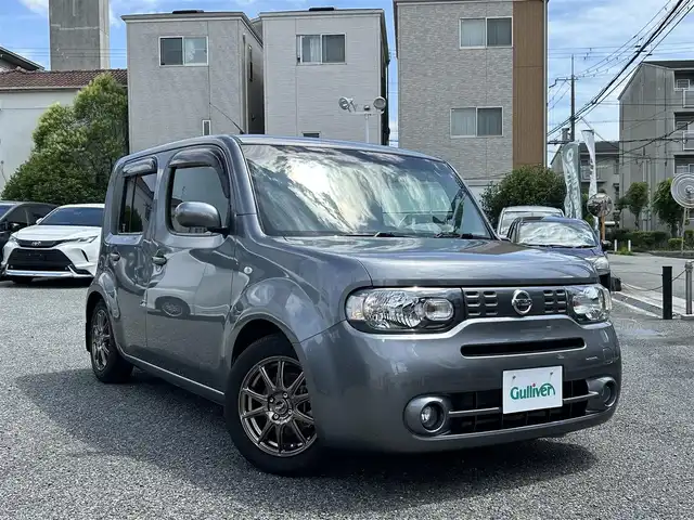日産 キューブ 15X 兵庫県 2016(平28)年 9.5万km ダークメタルグレー ・ワンオーナー/・純正メモリーナビ/・地デジ/DVD/BT/AUX/・ステアリングリモコン/・オートリトラクタブルミラー/・アイドリングストップ/・ETC/・スマートキー/・キセノンヘッドランプ/・社外15インチAW/・スタッドレスタイヤ付き純正ホイール（キャップ付き）/175/65R15 タイヤ溝5ミリ/・スペアキーあり
