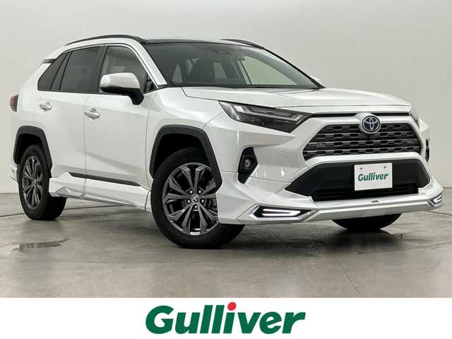 トヨタ ＲＡＶ４ ハイブリッドG 福岡県 2023(令5)年 3.1万km プラチナホワイトパールマイカ モデリスタエアロ/サンルーフ/純正10.5インチディスプレイオーディオナビ/プリクラッシュセーフティ/パーキングサポートブレーキ/車線逸脱/オートハイビーム/ブラインドスポットモニター/運転席パワーシート/ステアリングヒーター/前席シートヒーター／ベンチレーション/パワーバックドア/デジタルインナーミラー/レザーシート/ETC２．０