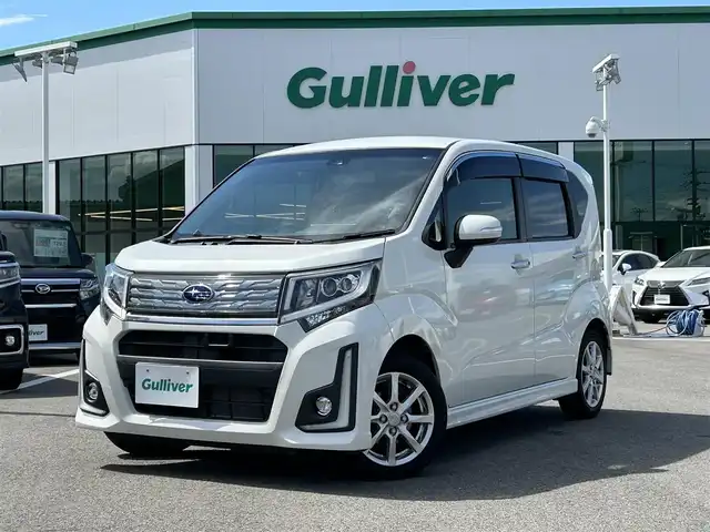 スバル ステラ カスタム R スマートアシスト 愛媛県 2016(平28)年 1.3万km パールホワイトⅢ 登録時走行距離：12515Km/ディーラーOP純正SDナビ/AM/FM/フルセグTV/Bluetooth/ETC/バックカメラ/アイドリングストップ/横滑り防止装置/盗難防止装置/衝突軽減システム/LEDヘッドライト/オートライト/フォグランプ/エンジンスタートボタン/ベンチシート/スマートキー/純正アルミホイール/純正フロアマット