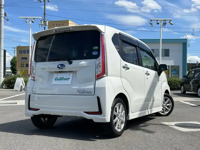スバル ステラ カスタム R スマートアシスト 愛媛県 2016(平28)年 1.3万km パールホワイトⅢ 登録時走行距離：12515Km/ディーラーOP純正SDナビ/AM/FM/フルセグTV/Bluetooth/ETC/バックカメラ/アイドリングストップ/横滑り防止装置/盗難防止装置/衝突軽減システム/LEDヘッドライト/オートライト/フォグランプ/エンジンスタートボタン/ベンチシート/スマートキー/純正アルミホイール/純正フロアマット