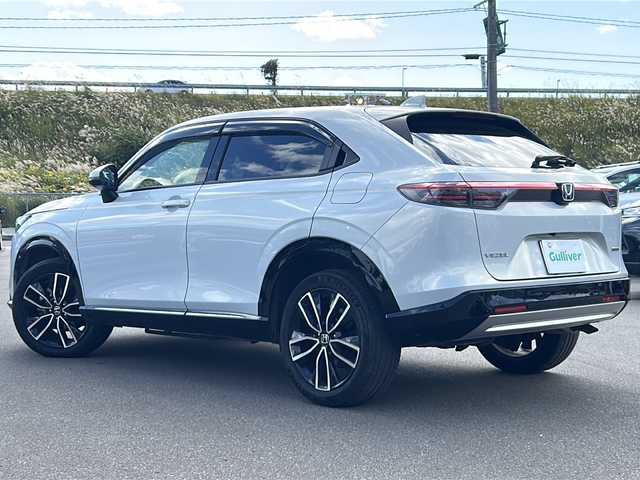 ホンダ ヴェゼル ハイブリッド e:HEV Z 青森県 2024(令6)年 3.3万km プレミアムサンライトホワイトパール ・4WD/・寒冷地仕様/・純正ディスプレイオーディオナビ/・TV/BT/AM/FM/・衝突軽減装置/・横滑り抑制装置/・レーンキープアシスト/・レーダークルーズコントロール/・前後コーナーセンサー/・前後ドライブレコーダー/・純正ETC2.0/・純正エンジンスターター/・パドルシフト/・タイプC/USBソケット/・ステアリングヒーター/・ハーフレザーシート/・オートマチックハイビーム/・シートヒーター/・スペアキー/・スタッドレスタイヤ積込/・純正AW18インチ