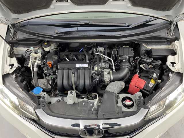 ホンダ フィット 13G L ホンダセンシング 福島県 2017(平29)年 10.5万km プレミアムホワイトパールⅡ /禁煙車//レーダークルーズコントロール//純正ナビ/フルセグＴＶ　/ＵＳＢ/BT//バックカメラ//ビルトインＥＴＣ//ドライブレコーダー//レーンアシスト//アルミ付きスタッドレス積込//ＬＥＤライト//ステアリングリモコン//レーンアシスト//オートハイビーム//フォグライト