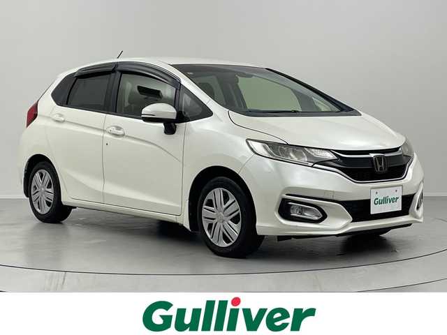ホンダ フィット 13G L ホンダセンシング 福島県 2017(平29)年 10.5万km プレミアムホワイトパールⅡ /禁煙車//レーダークルーズコントロール//純正ナビ/フルセグＴＶ　/ＵＳＢ/BT//バックカメラ//ビルトインＥＴＣ//ドライブレコーダー//レーンアシスト//アルミ付きスタッドレス積込//ＬＥＤライト//ステアリングリモコン//レーンアシスト//オートハイビーム//フォグライト