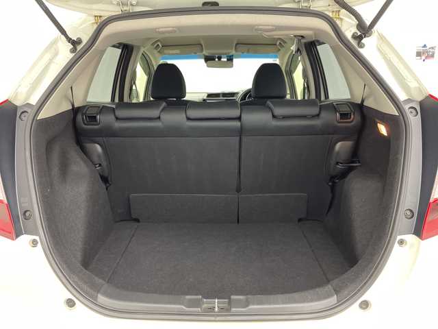 ホンダ フィット 13G L ホンダセンシング 福島県 2017(平29)年 10.5万km プレミアムホワイトパールⅡ /禁煙車//レーダークルーズコントロール//純正ナビ/フルセグＴＶ　/ＵＳＢ/BT//バックカメラ//ビルトインＥＴＣ//ドライブレコーダー//レーンアシスト//アルミ付きスタッドレス積込//ＬＥＤライト//ステアリングリモコン//レーンアシスト//オートハイビーム//フォグライト