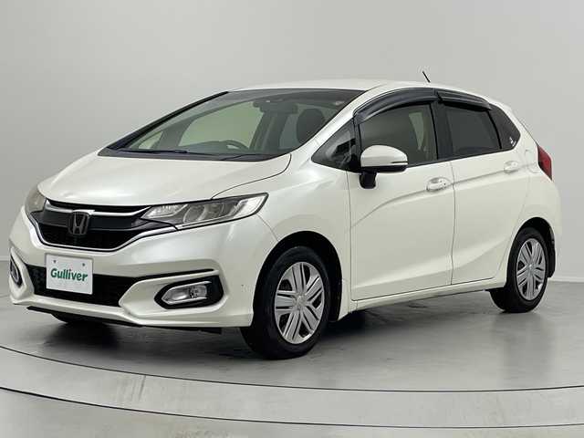 ホンダ フィット 13G L ホンダセンシング 福島県 2017(平29)年 10.5万km プレミアムホワイトパールⅡ /禁煙車//レーダークルーズコントロール//純正ナビ/フルセグＴＶ　/ＵＳＢ/BT//バックカメラ//ビルトインＥＴＣ//ドライブレコーダー//レーンアシスト//アルミ付きスタッドレス積込//ＬＥＤライト//ステアリングリモコン//レーンアシスト//オートハイビーム//フォグライト