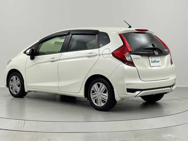 ホンダ フィット 13G L ホンダセンシング 福島県 2017(平29)年 10.5万km プレミアムホワイトパールⅡ /禁煙車//レーダークルーズコントロール//純正ナビ/フルセグＴＶ　/ＵＳＢ/BT//バックカメラ//ビルトインＥＴＣ//ドライブレコーダー//レーンアシスト//アルミ付きスタッドレス積込//ＬＥＤライト//ステアリングリモコン//レーンアシスト//オートハイビーム//フォグライト