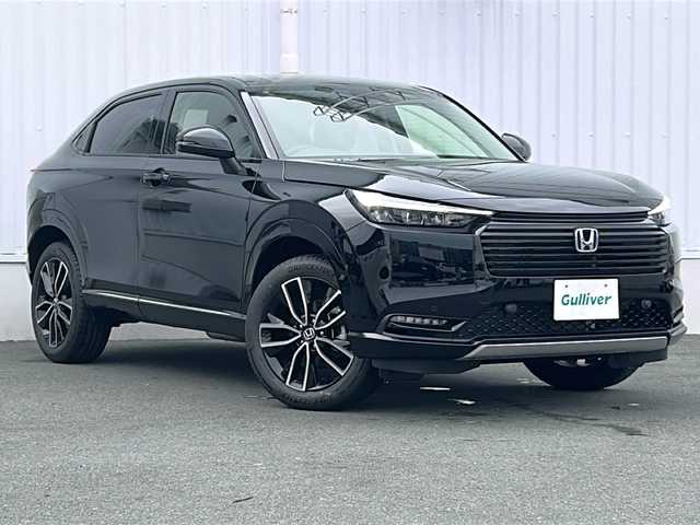 ホンダ ヴェゼル ハイブリッド e:HEV Z 三重県 2025(令7)年 0.1千km クリスタルブラックパール 登録済未使用　純正９型ディスプレイナビＴＶ　USB　Bluetooth　カープレイ対応　バックカメラ　ワイヤレス充電　ＢＳＭ　ハーフレザー　シートヒーター　ステアリングヒーター　ホンダセンシング　ハンドル支援　衝突軽減 追従クルコン　コーナーセンサー　ETC2.0　電動リアゲート　ダウンヒルアシスト　電動パーキングブレーキ　オートホールド　パドルシフト　LEDライト オートライト　フォグランプ　ステアリングスイッチ　禁煙車　ハンズフリーパワーバックドア/e:HEV Z　3VC4AZ　Honda CONNECTディスプレー+ETC2.0車載器+ワイヤレス充電器(220/000)
