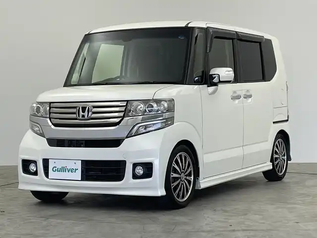 ホンダ Ｎ ＢＯＸ ターボ SSパッケージ 群馬県 2014(平26)年 7.3万km プレミアムホワイトパール 社外７インチナビ　バックカメラ　クルーズコントロール　両側パワースライドドア　衝突軽減ブレーキ　ステアリングスイッチ　パドルシフト　ＨＩＤヘッドライト　オートライト　純正アルミホイール　ＥＴＣ　禁煙車
