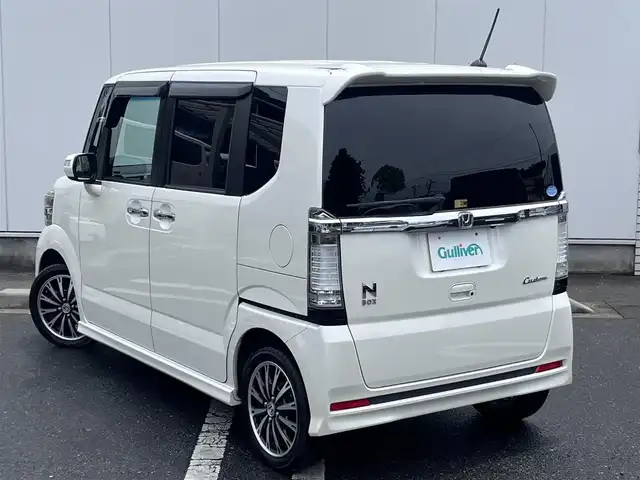 ホンダ Ｎ ＢＯＸ カスタム G ターボパッケージ 三重県 2013(平25)年 10.8万km プレミアムホワイトパール 純正ナビ(Bluetooth/SD/CD/DVD/USB/地デジTV/FM/AM)/バックカメラ/ETC/ドライブレコーダー(前後)/ターボ/クルーズコントロール/両側パワースライドドア/HIDヘッドランプ/LEDイルミネーションランプ/フロントフォグランプ/純正フロアマット/ドアバイザー/電動格納ドアミラー/革巻きステアリングホイール/プッシュスタート/スマートキーシステム/スペアキー
