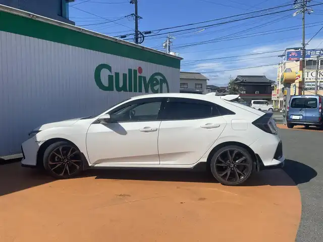 ホンダ シビック ハッチバック ホンダセンシング 三重県 2019(令1)年 9万km ホワイトオーキッドパール 純正Gathersインターナビ/バックカメラ/ホンダセンシング（安全運転支援）/LEDヘッドライト/オートライト/ボディ同色電動オート格納ドアミラー/ヒーター/ウィンカー/235/40R18タイヤ/　＊18インチアルミホイール/革巻ステアリングホイール/チルト/テレスコピックハンドル/SRSエアバック（運転席/助手席/サイド/カーテン）/マルチインフォメーションディスプレイ/オートエアコン/シートヒーター（運転席/助手席）/エンジンスタートボタン/スマートキー/ビルトインETC