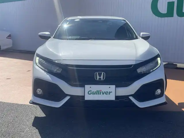 ホンダ シビック ハッチバック ホンダセンシング 三重県 2019(令1)年 9万km ホワイトオーキッドパール 純正Gathersインターナビ/バックカメラ/ホンダセンシング（安全運転支援）/LEDヘッドライト/オートライト/ボディ同色電動オート格納ドアミラー/ヒーター/ウィンカー/235/40R18タイヤ/　＊18インチアルミホイール/革巻ステアリングホイール/チルト/テレスコピックハンドル/SRSエアバック（運転席/助手席/サイド/カーテン）/マルチインフォメーションディスプレイ/オートエアコン/シートヒーター（運転席/助手席）/エンジンスタートボタン/スマートキー/ビルトインETC