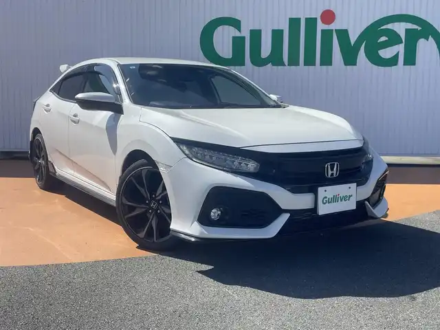 ホンダ シビック ハッチバック ホンダセンシング 三重県 2019(令1)年 9万km ホワイトオーキッドパール 純正Gathersインターナビ/バックカメラ/ホンダセンシング（安全運転支援）/LEDヘッドライト/オートライト/ボディ同色電動オート格納ドアミラー/ヒーター/ウィンカー/235/40R18タイヤ/　＊18インチアルミホイール/革巻ステアリングホイール/チルト/テレスコピックハンドル/SRSエアバック（運転席/助手席/サイド/カーテン）/マルチインフォメーションディスプレイ/オートエアコン/シートヒーター（運転席/助手席）/エンジンスタートボタン/スマートキー/ビルトインETC