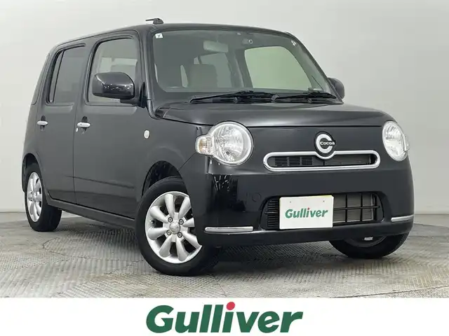 ダイハツ ミラ ココア X 道央・札幌 2013(平25)年 4.2万km ブラックマイカメタリック ・４WD/・社外メモリナビ/・バックカメラ/・ＥＴＣ/・前後ドライブレコーダー/・オートエアコン/・社外フロアマット/・電動格納ミラー/・社外エンジンスターター/・パワーウインドウ/・社外アルミホイール/・ハロゲンヘッドライト/・プッシュスタート/・スマートキー