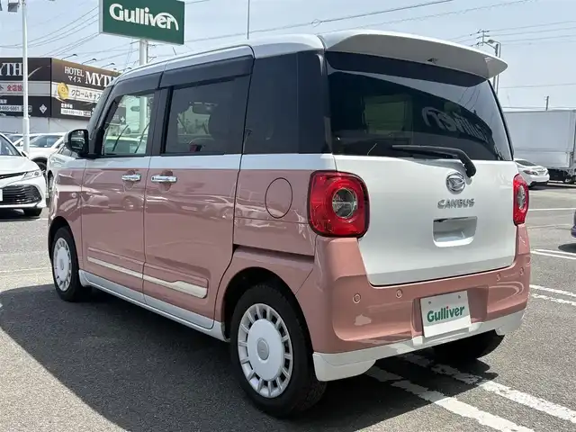 ダイハツ ムーヴ キャンバス ストライプス G 徳島県 2023(令5)年 1.3万km シャイニングホワイトパール/アプリコットピンクメタリック 純正ディスプレイオーディオ/（HDMI/TV/ラジオ/Apple CarPlay/AndroidAuto）/フルセグTV/ETC/前後ドラレコ/バックカメラ/プッシュスタート/スマートキー/ブレーキホールド/電動パーキング/ホットカップホルダー/両側パワースライドドア/スペアキー/LEDヘッドライト/LEDフォグライト/衝突被害軽減システム
