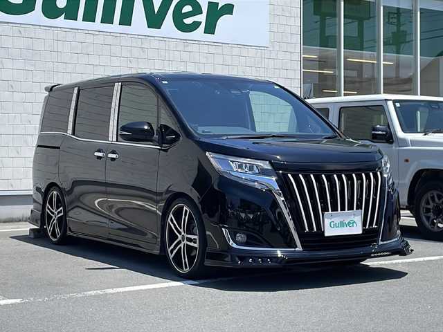 トヨタ エスクァイア Gi 静岡県 2019(令1)年 4.3万km ブラック ディスプレイオーディオ/Bluetooth/フリップダウンリアモニター/両側パワースライドドア/エムズスピードエアロ/エムズスピード19インチAW/合成シート/シートヒーター/バックカメラ/スマートキー