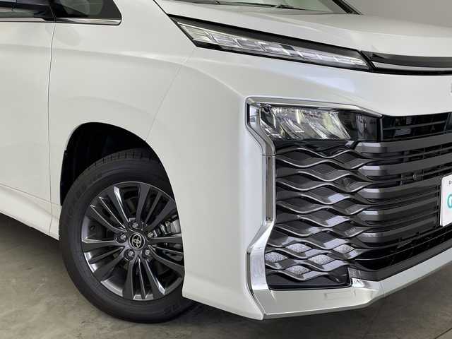 トヨタ ヴォクシー ハイブリッド S－Z 新潟県 2025(令7)年 0.1万km未満 ホワイトパールクリスタルシャイン 純正ディスプレイオーディオ/（BT/FM/AM/フルセグTV/DVD）/バックカメラ/ステアリングスイッチ/ステアリングヒーター/ハーフレザーシート/シートヒーター（1.2列目）/ワイパーデアイサー/AC100V/純正LEDオートヘッドライト/デジタルインナーミラー/電動リアゲート/両側パワースライドドア/サンシェード/電格ミラー/ウィンカーミラー/ヘッドライトレベライザー/ETC/取扱説明書/保証書