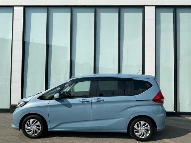 ホンダ フリード G ホンダセンシング 大阪府 2020(令2)年 6.4万km シーグラスブルーパール 純正ナビ/   フルセグTV/CD/DVD/Bluetooth/USB/バックモニター/衝突軽減ブレーキ　/横滑り防止装置/両側パワースライドドア/前席シートヒーター/レーダークルーズコントロール/レーンキープアシスト/アイドリングストップ/純正フロアマット/プッシュスタート/スマートキー/ＥＴＣ/ＬＥＤ/禁煙車