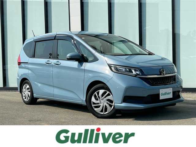 ホンダ フリード G ホンダセンシング 大阪府 2020(令2)年 6.4万km シーグラスブルーパール 純正ナビ/   フルセグTV/CD/DVD/Bluetooth/USB/バックモニター/衝突軽減ブレーキ　/横滑り防止装置/両側パワースライドドア/前席シートヒーター/レーダークルーズコントロール/レーンキープアシスト/アイドリングストップ/純正フロアマット/プッシュスタート/スマートキー/ＥＴＣ/ＬＥＤ/禁煙車