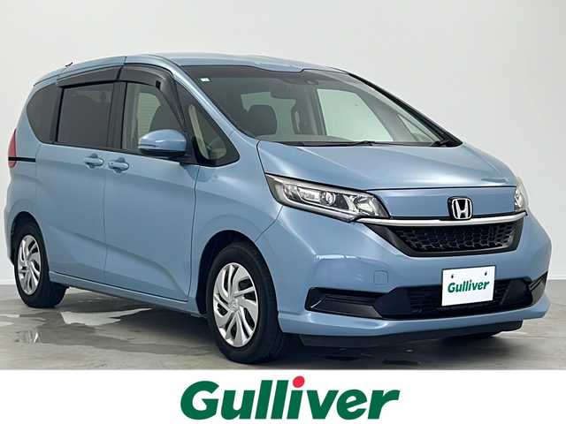 ホンダ フリード G ホンダセンシング 大阪府 2020(令2)年 6.4万km シーグラスブルーパール 純正ナビ/   フルセグTV/CD/DVD/Bluetooth/USB/バックモニター/衝突軽減ブレーキ　/横滑り防止装置/両側パワースライドドア/前席シートヒーター/レーダークルーズコントロール/レーンキープアシスト/アイドリングストップ/純正フロアマット/プッシュスタート/スマートキー/ＥＴＣ/ＬＥＤ/禁煙車