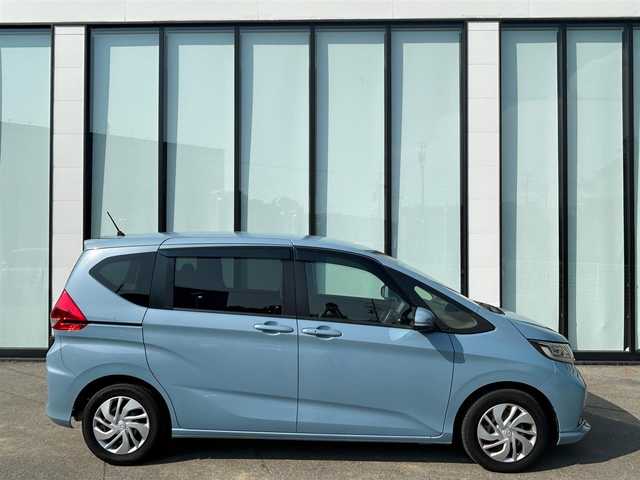 ホンダ フリード G ホンダセンシング 大阪府 2020(令2)年 6.4万km シーグラスブルーパール 純正ナビ/   フルセグTV/CD/DVD/Bluetooth/USB/バックモニター/衝突軽減ブレーキ　/横滑り防止装置/両側パワースライドドア/前席シートヒーター/レーダークルーズコントロール/レーンキープアシスト/アイドリングストップ/純正フロアマット/プッシュスタート/スマートキー/ＥＴＣ/ＬＥＤ/禁煙車