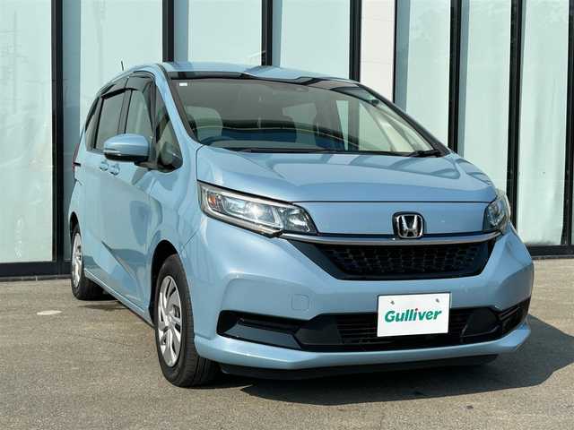 ホンダ フリード G ホンダセンシング 大阪府 2020(令2)年 6.4万km シーグラスブルーパール 純正ナビ/   フルセグTV/CD/DVD/Bluetooth/USB/バックモニター/衝突軽減ブレーキ　/横滑り防止装置/両側パワースライドドア/前席シートヒーター/レーダークルーズコントロール/レーンキープアシスト/アイドリングストップ/純正フロアマット/プッシュスタート/スマートキー/ＥＴＣ/ＬＥＤ/禁煙車