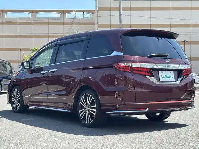 ホンダ オデッセイ アブソルート 宮城県 2015(平27)年 5万km プレミアムディープロッソパール 登録時走行距離49716km/純正SDナビ/FM・AM・Bluetooth・CD・DVD・ワンセグTV/バックカメラ/両側パワースライドドア/プッシュスタート/スマートキー/ETC/3列シート/クルーズコントロール/ホンダセンシング/フリップダウンモニター（VM-155N）/フォグランプ/純正フロアマット/純正アルミホイール/ハーフレザーシート
