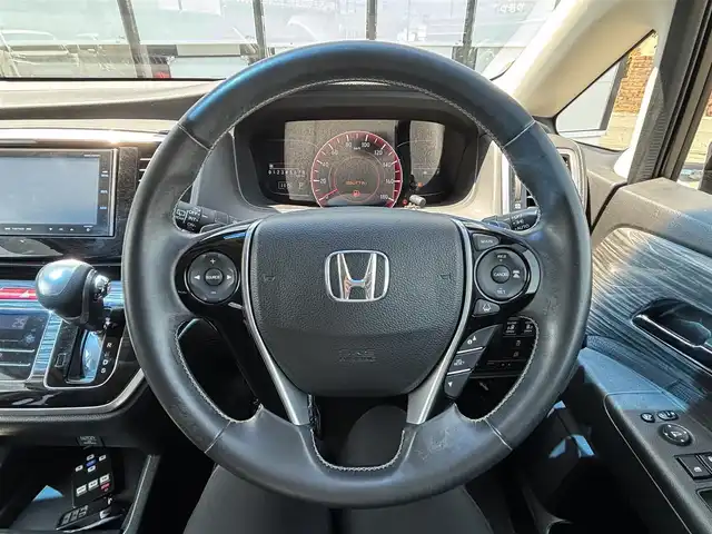ホンダ オデッセイ アブソルート 宮城県 2015(平27)年 5万km プレミアムディープロッソパール 登録時走行距離49716km/純正SDナビ/FM・AM・Bluetooth・CD・DVD・ワンセグTV/バックカメラ/両側パワースライドドア/プッシュスタート/スマートキー/ETC/3列シート/クルーズコントロール/ホンダセンシング/フリップダウンモニター（VM-155N）/フォグランプ/純正フロアマット/純正アルミホイール/ハーフレザーシート