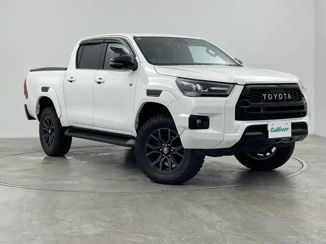 トヨタ ハイラックス Z GRスポーツ 群馬県 2022(令4)年 3.7万km スーパーホワイトⅡ ・純正８インチディスプレイオーディオ/・バックカメラ/・パノラミックビュー/・ダウンヒルアシストコントロール/・レーダークルーズコントロール/・ドライブレコーダー/・パドルシフト/・パワーシート/・ETC/・レーンアシスト/・LDA/・横滑り防止装置/・盗難防止装置/・衝突被害軽減システム/・プッシュスタート/・純正フロアマット/・ハーフレザーシート/・純正１８インチアルミホイール/・LEDヘッドライト/・プリクラッシュセーフティ