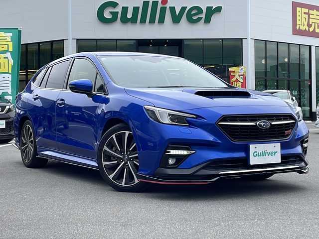 スバル レヴォーグ 1．8STIスポーツ EX 長野県 2020(令2)年 3.9万km WRブルーパール アイサイトコアテクノロジー/・前側方プリクラッシュブレーキ/・緊急時プリクラッシュステアリング/・誤発進抑制機能/・ツーリングアシスト/・青信号お知らせ機能/・先行車発進お知らせ機能/・全車速追従機能付クルーズコントロール/・ふらつき警報/・車線逸脱警報/・車線逸脱抑制/・死角車両検知/・スマートリアビューミラー/11．6インチセンターインフォメーションディスプレイ/(フルセグ/Bluetooth/AppleCarPlay/AndroidAuto)/バックカメラ/サイドカメラ/前後コーナーセンサー/ビルトインETC/レザーシート/全席シートヒーター/パワーシート(運転席メモリー機能付)/STiエアロ(F・S・R)/電動リアゲート/革巻きステアリング/ステアリングスイッチ/パドルシフト/電動パーキングブレーキ/ブレーキホールド/LEDヘッドライト/フォグランプ/スマートキー/プッシュスタート/電動格納ミラー/純正18インチアルミホイール/純正フロアマット