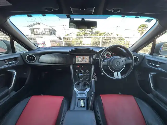 トヨタ ８６ GT 静岡県 2012(平24)年 9.5万km オレンジメタリック ユーザー買取車両/純正HDDナビ（NHZA-W61G）/【AM/FM/CD/BT/TV】/純正17インチAW/MTモード付AT/パドルシフト/スマートキー/エンジンスタートボタン/バックカメラ/ETC/レザーシート/純正エアロパーツ（フロント、サイド、リア）/横滑り防止装置/ドライブレコーダー/保証書/取扱説明書