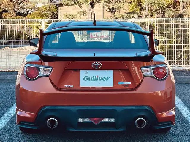 トヨタ ８６ GT 静岡県 2012(平24)年 9.5万km オレンジメタリック ユーザー買取車両/純正HDDナビ（NHZA-W61G）/【AM/FM/CD/BT/TV】/純正17インチAW/MTモード付AT/パドルシフト/スマートキー/エンジンスタートボタン/バックカメラ/ETC/レザーシート/純正エアロパーツ（フロント、サイド、リア）/横滑り防止装置/ドライブレコーダー/保証書/取扱説明書