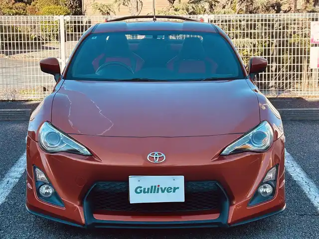 トヨタ ８６ GT 静岡県 2012(平24)年 9.5万km オレンジメタリック ユーザー買取車両/純正HDDナビ（NHZA-W61G）/【AM/FM/CD/BT/TV】/純正17インチAW/MTモード付AT/パドルシフト/スマートキー/エンジンスタートボタン/バックカメラ/ETC/レザーシート/純正エアロパーツ（フロント、サイド、リア）/横滑り防止装置/ドライブレコーダー/保証書/取扱説明書