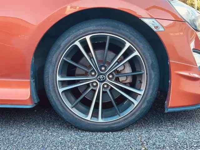 トヨタ ８６ GT 静岡県 2012(平24)年 9.5万km オレンジメタリック ユーザー買取車両/純正HDDナビ（NHZA-W61G）/【AM/FM/CD/BT/TV】/純正17インチAW/MTモード付AT/パドルシフト/スマートキー/エンジンスタートボタン/バックカメラ/ETC/レザーシート/純正エアロパーツ（フロント、サイド、リア）/横滑り防止装置/ドライブレコーダー/保証書/取扱説明書