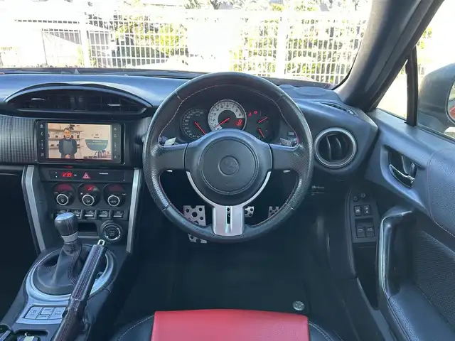 トヨタ ８６ GT 静岡県 2012(平24)年 9.5万km オレンジメタリック ユーザー買取車両/純正HDDナビ（NHZA-W61G）/【AM/FM/CD/BT/TV】/純正17インチAW/MTモード付AT/パドルシフト/スマートキー/エンジンスタートボタン/バックカメラ/ETC/レザーシート/純正エアロパーツ（フロント、サイド、リア）/横滑り防止装置/ドライブレコーダー/保証書/取扱説明書