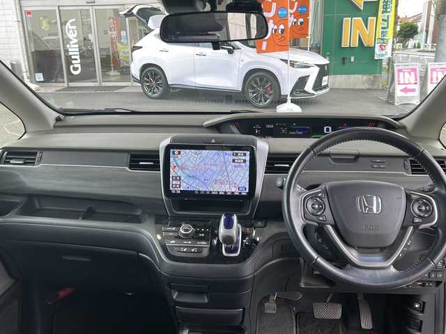 ホンダ フリード ハイブリット EX 東京都 2018(平30)年 6.7万km ホワイトオーキッドパール ワンオーナー/Panasonicポータブルナビゲーション（Bluetooth接続、フルセグテレビ）/カロッツェリア後席モニター/スマートキー/バックカメラ/ビルトインETC/三列シート/ウォークスルー/純正フロアマット/クルーズコントロール/プッシュスタート/ABS/横滑り防止機能/レーンキープアシスト/オートライト/スペアキー/ハーフレザーシート